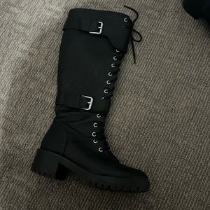Black tall tie up leather boot